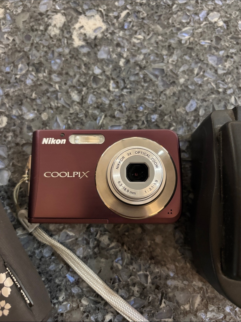 Nikon COOLPIX Compact Digital Camera - Burgundy with Wrist Strap and Memory Card